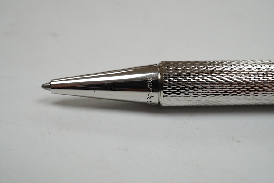 A Cartier pen, 14cm long, boxed. Condition - good